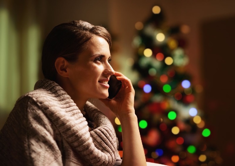 Woman on Phone at Christmas